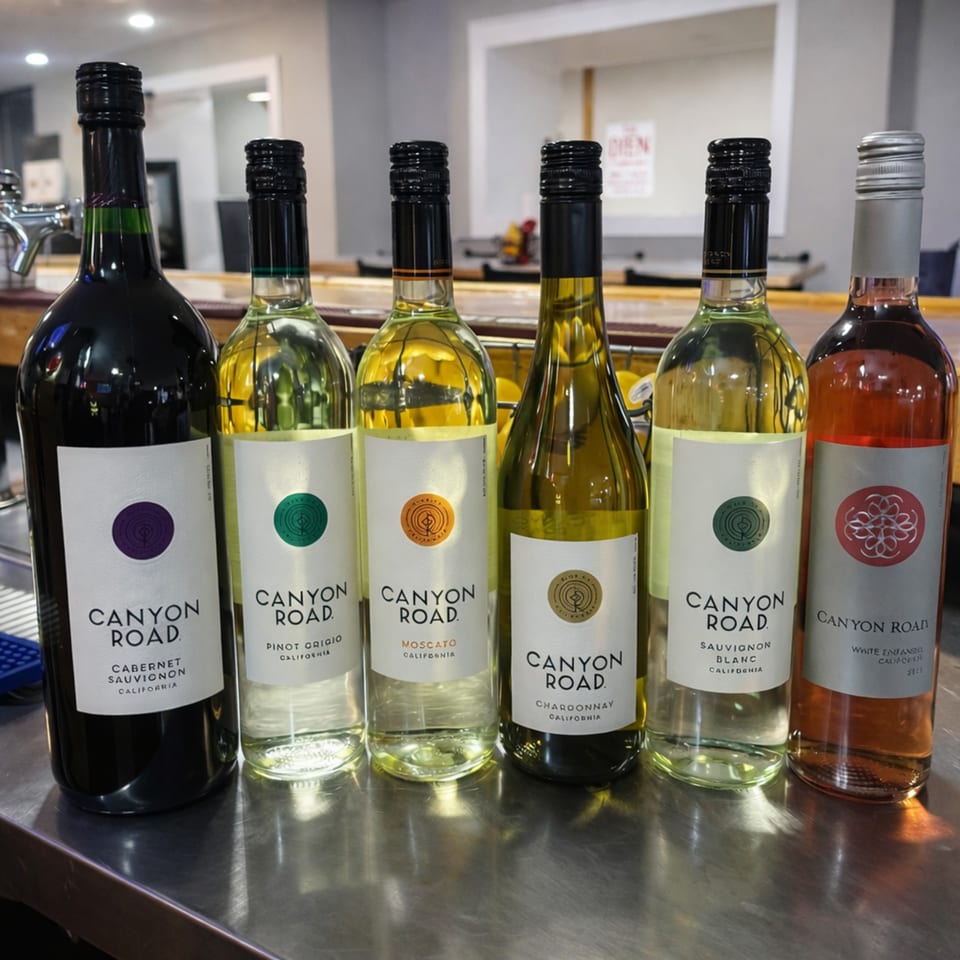 Six bottles of Canyon Road wine, including Cabernet Sauvignon, Pinot Grigio, Moscato, Chardonnay, Sauvignon Blanc, and White Zinfandel.
